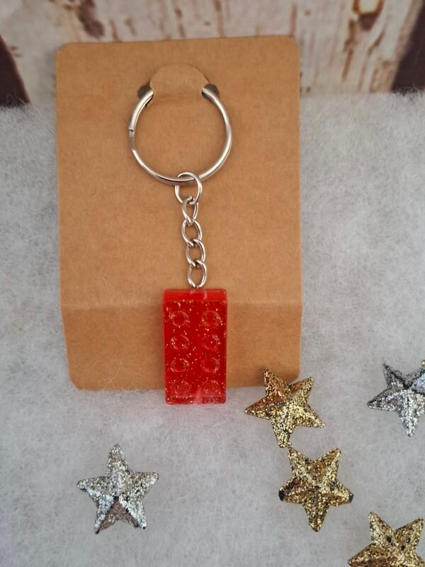 Magnifique porte-clés rectangle magique en résine rose, orné de paillettes scintillantes, mesurant 2,9 cm de hauteur et 1,5 cm de largeur, parfait pour ajouter une touche élégante à vos clés ou sacs.