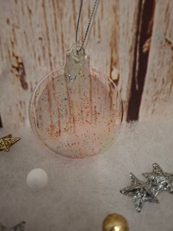 creatrice-floral-noel-fetes-cadeaux-002 Création en résine fine, scintillements délicats capturés à l’intérieur pour sublimer votre décoration.