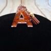 Petit porte-clés A en résine fait main, décoré de paillettes lumineuses, parfait pour offrir ou garder près de soi.