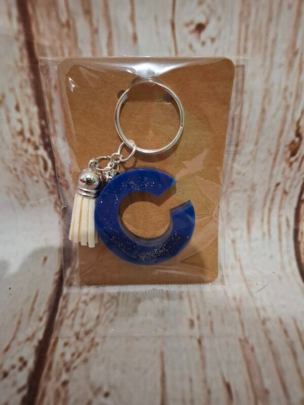 faitmain-couleurs-personnalisation-crochet-artisanat-flowers-nuit-mariages-noel-cadeaux-004 C en Cosmynuit, accessoire délicat et original, complété par un pompon doux, idéal comme cadeau ou petit objet décoratif à emporter partout.